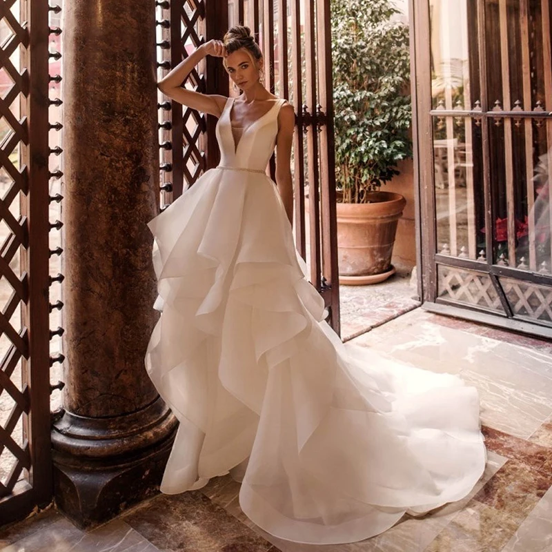 

Luxury A-Line Soft Satin Wedding Dresses Sleeveless V-neck Backless Glamorous Gowns Belt Delicate layered Ruffle Robe de mariée