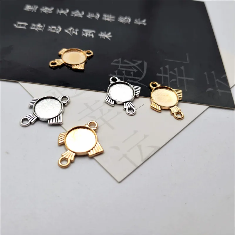 

10 шт./лот, металлическая подвеска в форме рыбы, стеклянный кабошон, подходит для круглых браслетов 10 мм, рамка для лотка, фурнитура для изгото...