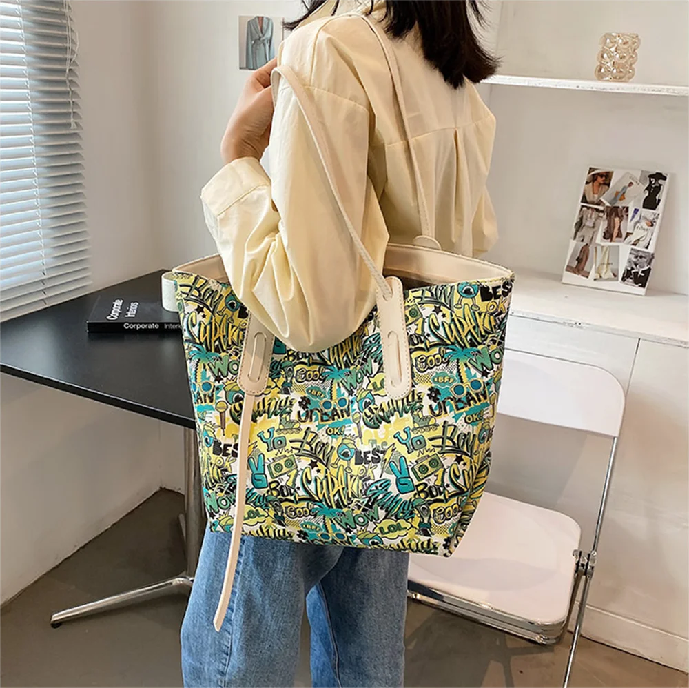 

New Large-capacity handbag new fashion graffiti commuter popular hand bill of lading shoulder tote bag