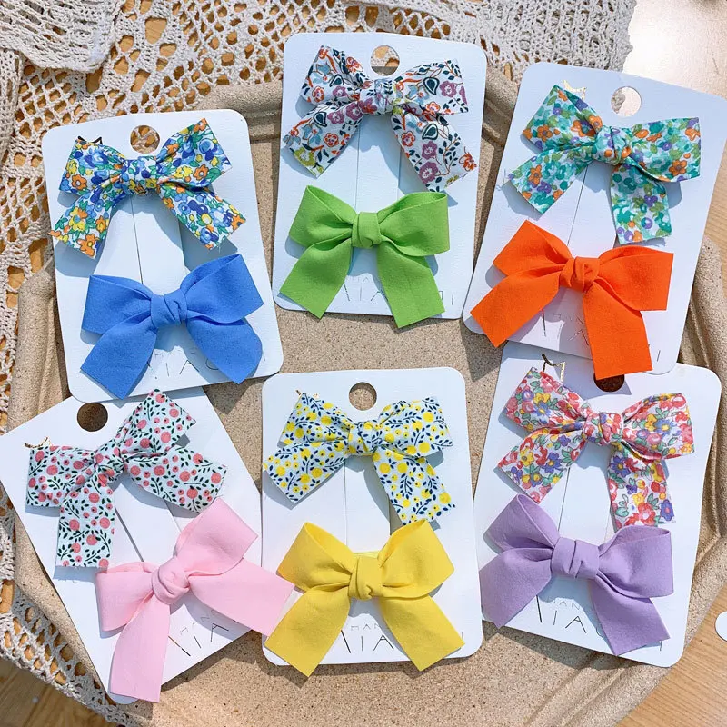 

2pcs/lot Fashion Girls Hairpins Children Handmade Bowknot Hair Clip Cloth Flower Print Duck Clip Solid Barrette Hair Accessories