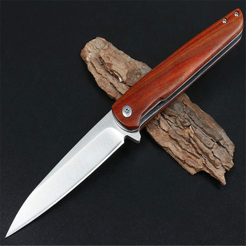 

Punisher Of Free Wolf Flding Knife 5cr13 Sharp Blade Natural Blood Sandalwood On Both Sides High Hardness Camping Survival Tools