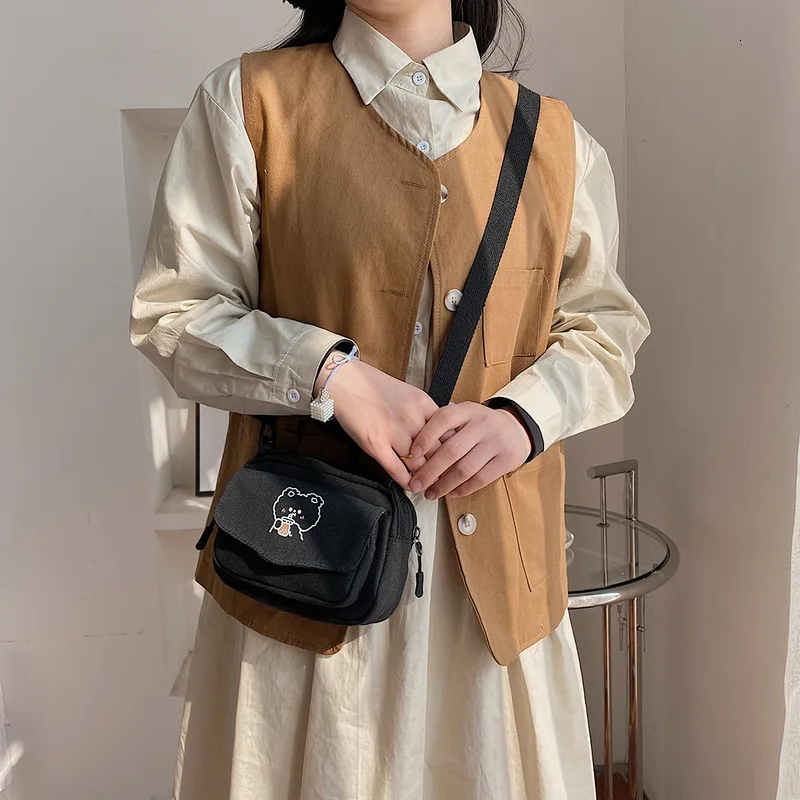 

Women's Canvas Messenger Bag Preppy Style Student Tote Shoulder Messenger Bag Small Crossbody Bag Satchel Travel Purse Handbag