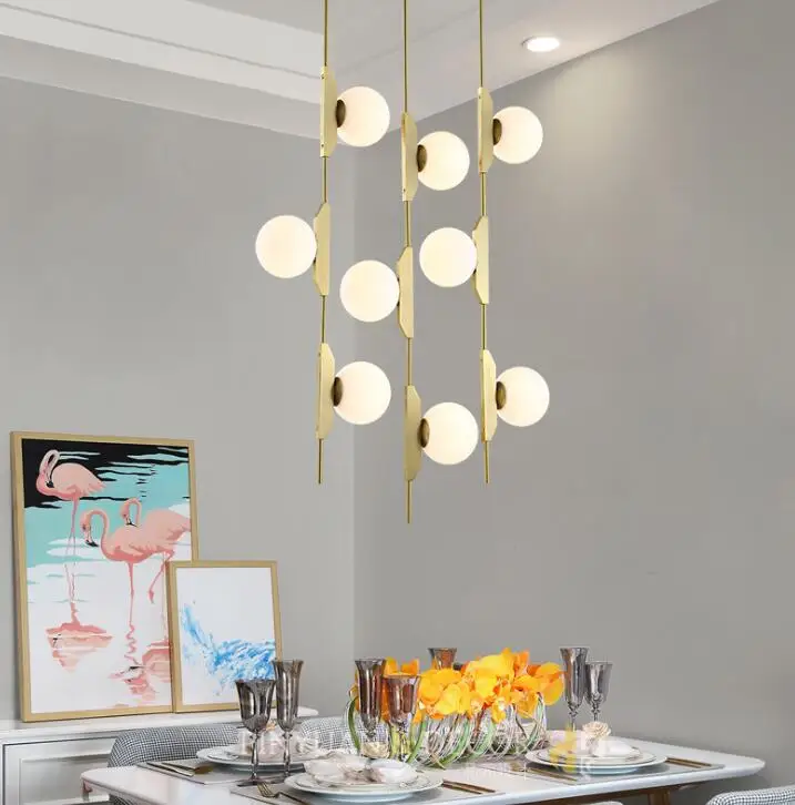 

Nordic style creative personality long head vertical modern minimalist glass ball art magic bean chandelier