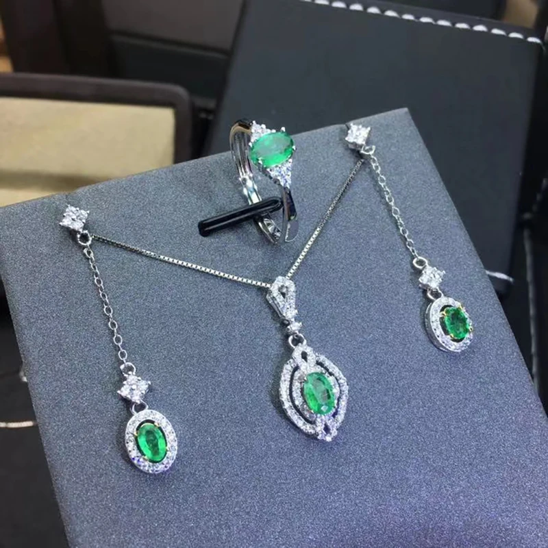 

Комплект женский из кольца и серег, изумруд, из серебра 925 пробы