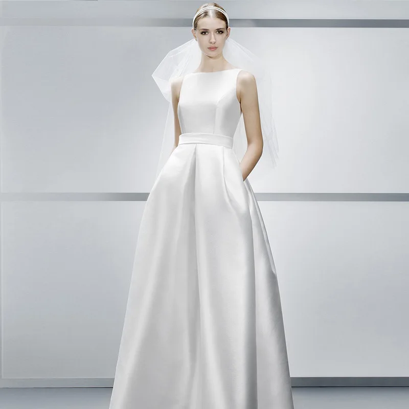 

2021 luxury design high-end simple foreign style fashion large pocket white dress temperament sexy slim light wedding dress