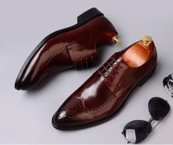 Мужские модельные туфли из воловьей кожи на низком каблуке с резным узором