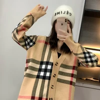 new autumnwinter 2021 thickened sweater is paired with a classic plaid striped cardigan jacket for women
