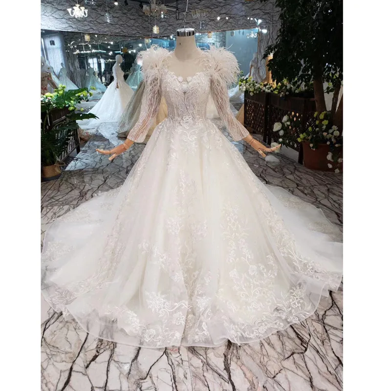 

BGW HT4289 Princess Wedding Dress With Feather Full Sleeve O-neck Appliques Lace Up Open Back Bride Wedding Gown With Long Train