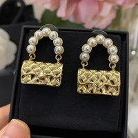 temperament brand jewelry bag modeling earrings women lnlaid pearl golden luxury dance party fashion trend hot sale grace 2022