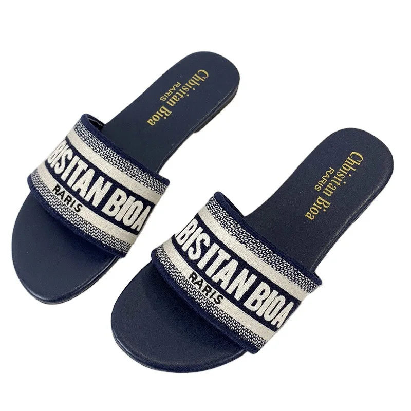 

Vacation slippers women's outer wear new fashion all-match net celebrity flat-bottomed European and American lazy sandals