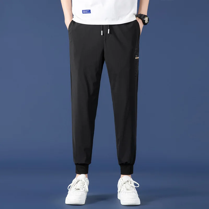 

Casual pants men's legged Harem Pants fashion brand men's loose spring and summer long casual pants fashion summer thin