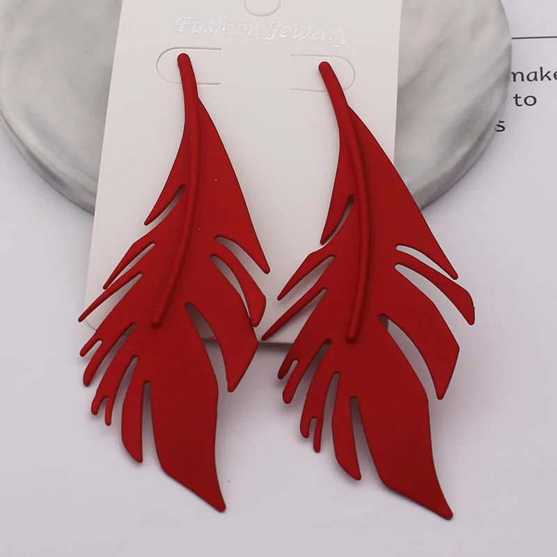 Женские длинные серьги-гвоздики с большими листьями и перьями | Украшения