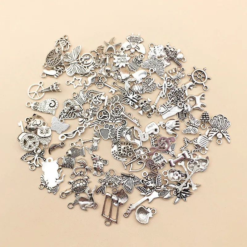 

100pcs/lot Random Mixed Shape Tibetan Silver Charms Pendants For DIY Jewelry Making For Women Men