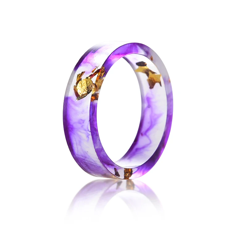 Металлические ювелирные изделия из смолы с золотой фольгой внутри свежее