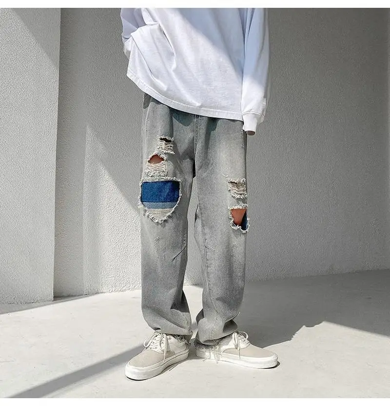 

Ripped jeans men's patchwork pants autumn new fashion European American high street hip-hop style loose straight wide-leg pants