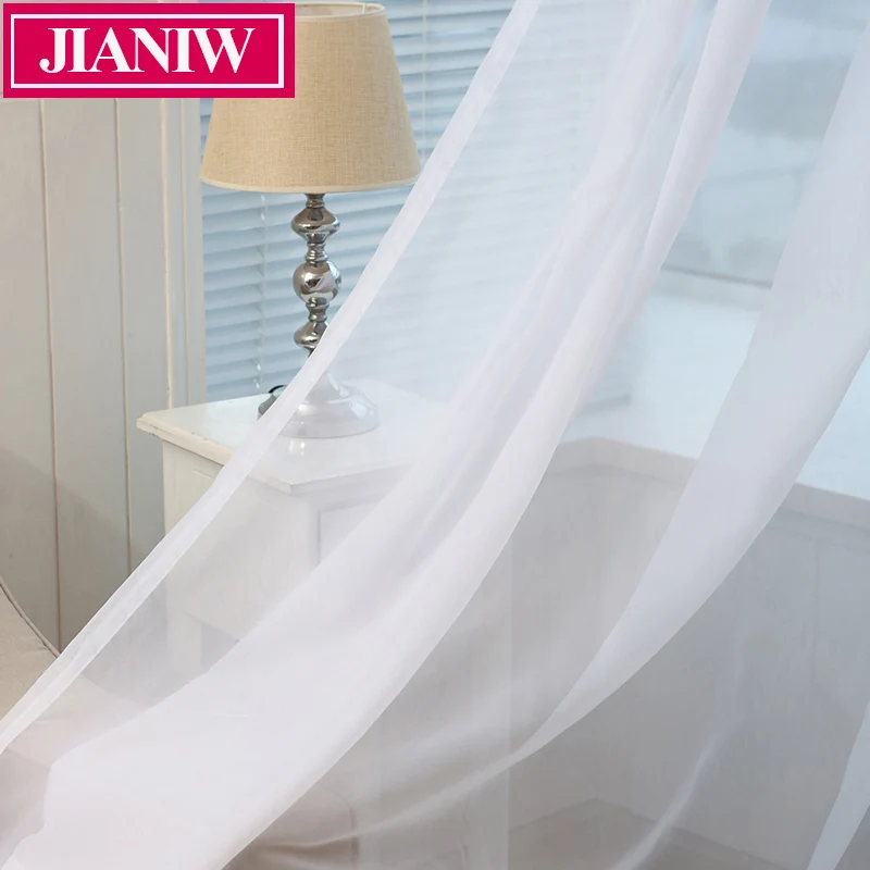 

JIANIW Cheap White Semi Sheer Window Elegance Curtains Drape Panels Voile Curtain Tulle Treatment for Bedroom Living Room