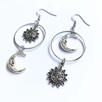 sun and moon dangly earrings witchy dangle earrings silver colour mismatched earrings celestial jewellery