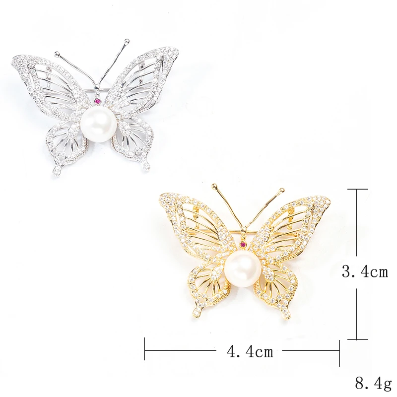 Женская брошь в форме бабочки Karopel Серебряного и золотого цвета с фианитом