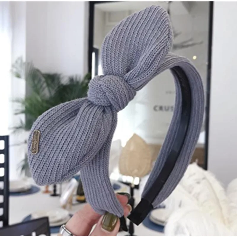 Повязка на голову женская шерстяная однотонная с бантом аксессуар для волос