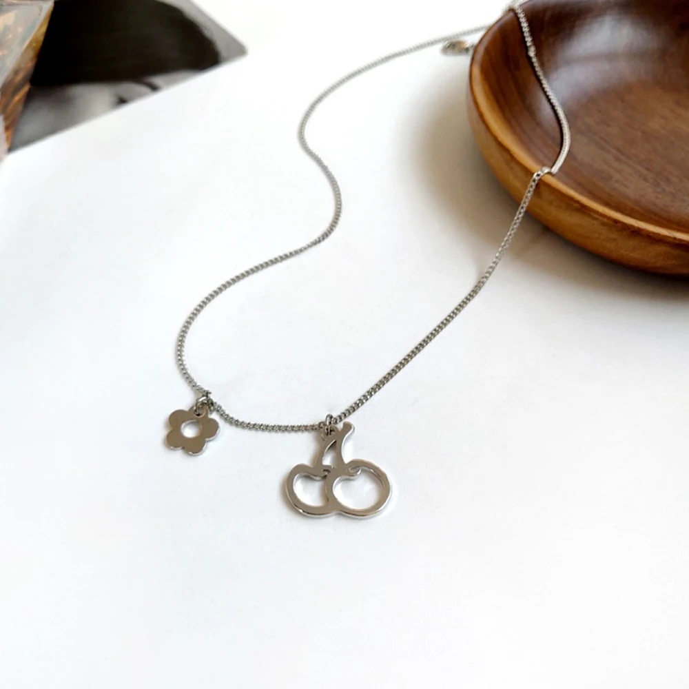 

In 2021 South Korea Irregular Fashion Sweet Cherry Pendant Necklace Hollow Out Sell Like Hot Cakes Personality Girl Necklace