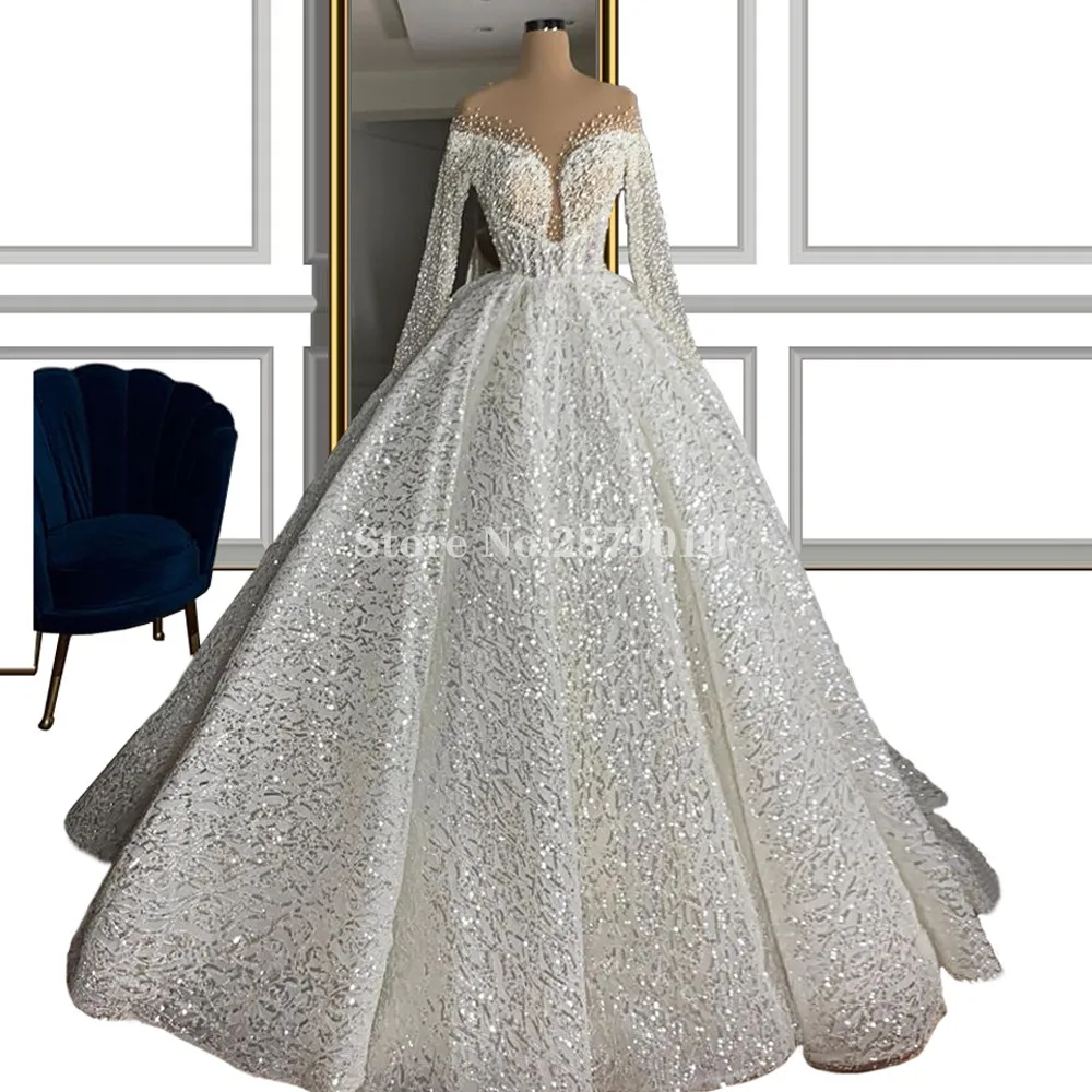 

Illusion Arabic Luxury Wedding Dress Beads Sequins Pearls Ball Gown Long Sleeves Floor-Length Wedding Dress Bridal Gowns Dubai