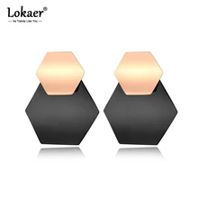 Изогнутые шестигранные серьги Lokaer цвета розового золота с