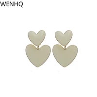wenhq new arrival double heart mosquito coil clip on earrings for women girl fashion korea style gold color enamel drop earring