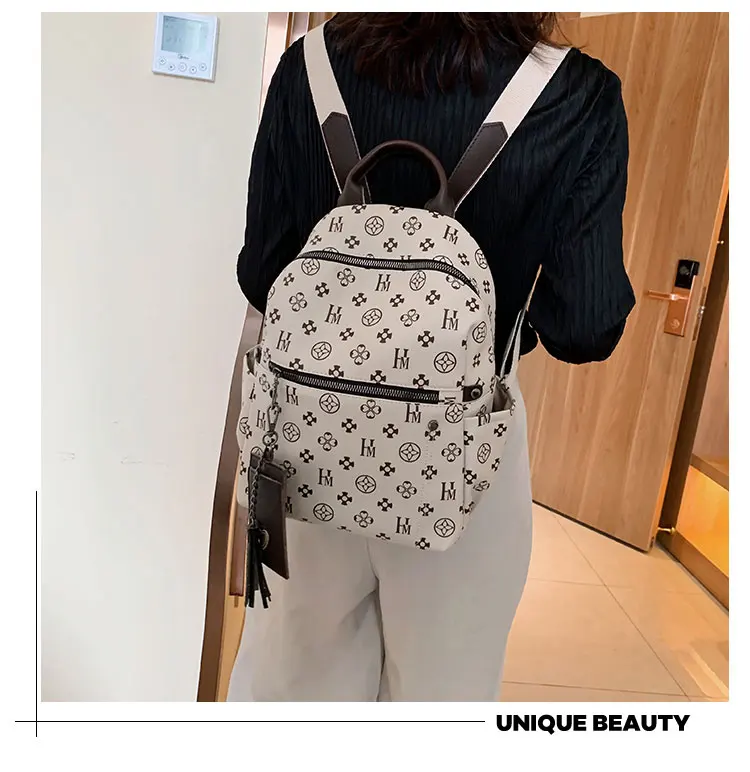 

Classic Printing Backpack Leather Designer Backpack With Tassel Luxury Vintage Backpack High Quality Women Bags