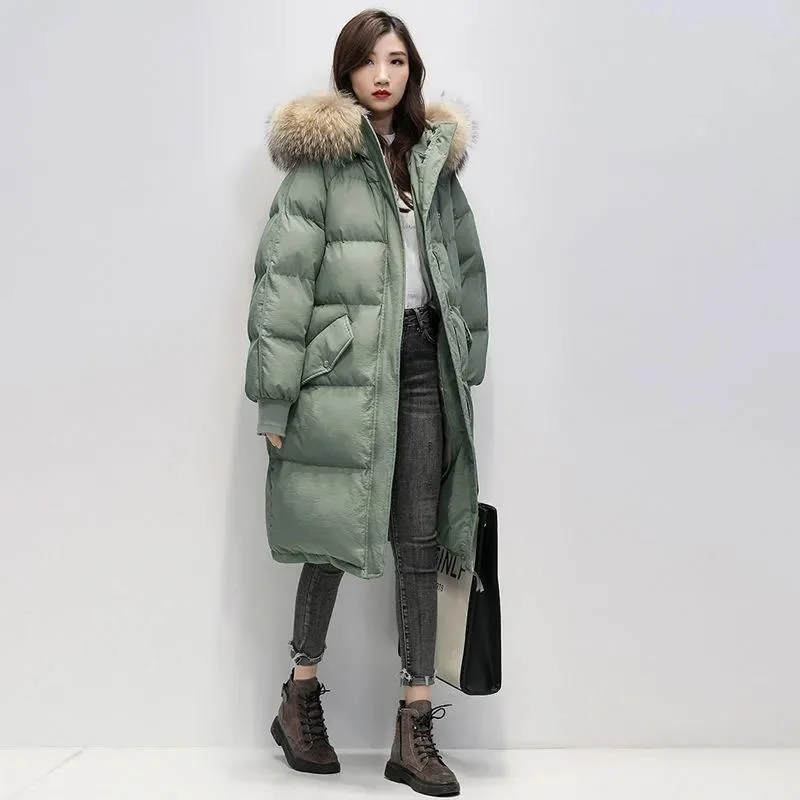 

Женская зимняя стеганая куртка в Корейском стиле с большим меховым воротником и капюшоном, длинные пуховые парки из хлопка, теплая свободна...