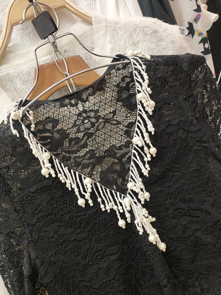 

Free shipping heavy craft nail bead sexy V-neck hollow lace jumpsuit ladies spring new retro wild temperament