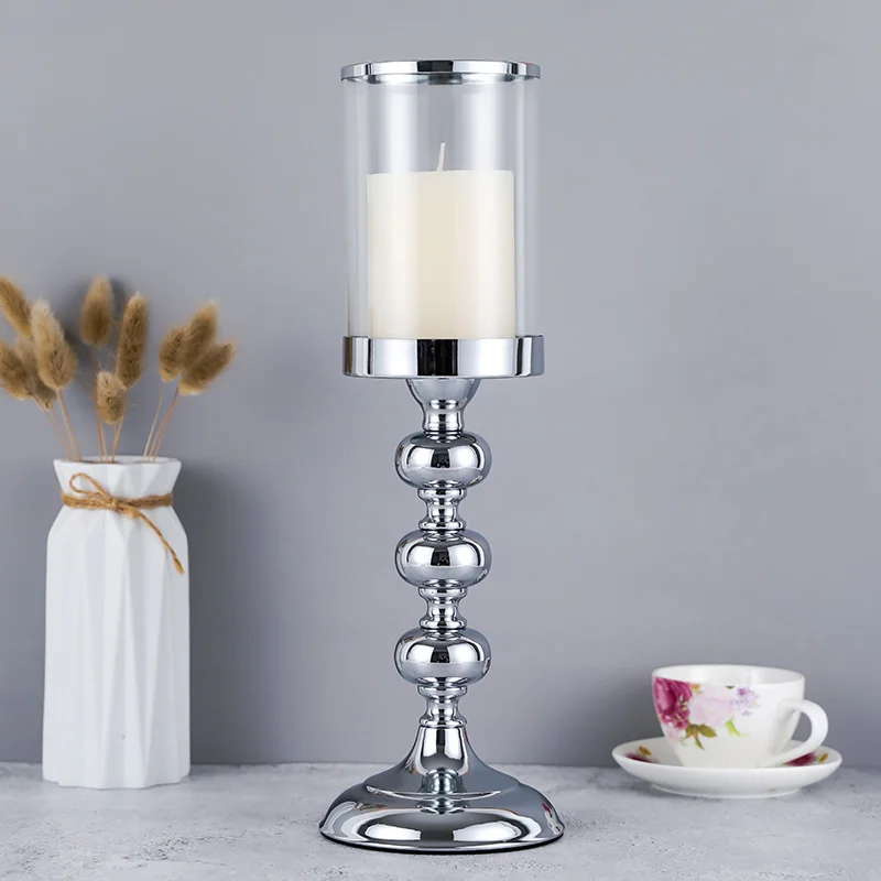 С украшением в виде кристаллов подсвечник для свечи столба используется свадьбы