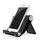 Новый универсальный держатель для смартфона