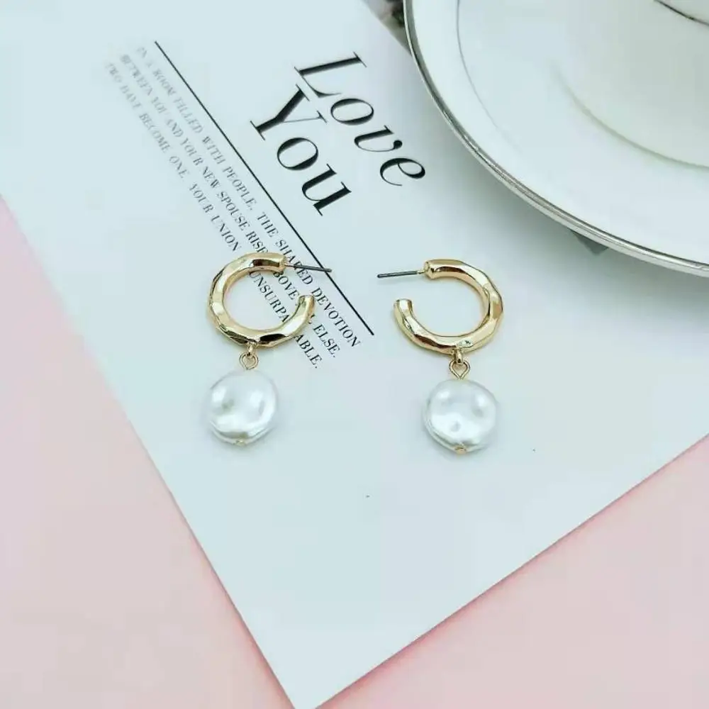 Милые женские серьги золотистого цвета с покрытием хорошего качества круглые