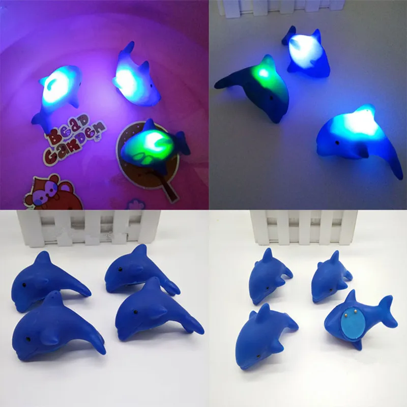 1pc Baby Water Flashing Floating Dolphins Kids Automatic Led Lighting up Beach Play Toys For Children for the Bathroom Bath Swim