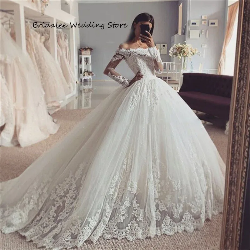 

Свадебное платье с длинным рукавом, сдержанное кружевное платье невесты с аппликацией, с воротником «Лодочка», длинное садовое, пошив на за...