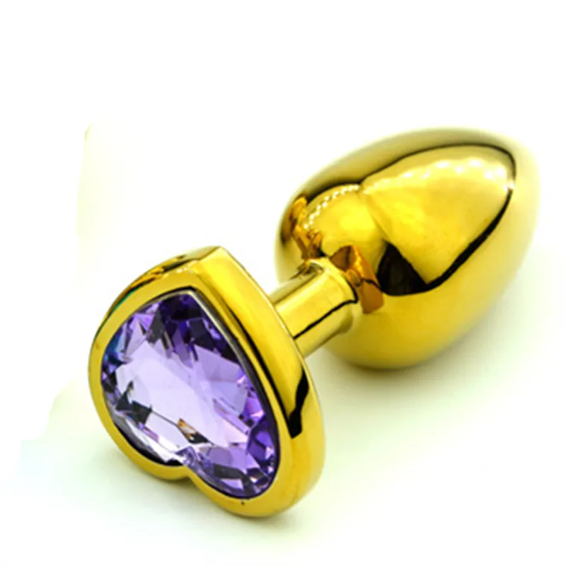 Анальная пробка золотого цвета 3 размера вы можете выбрать интимные игрушки для