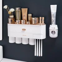 magnetic toothbrush holder automatic toothpaste squeezer multifunction toothpaste dispenser wallmounted bathroom accessories set