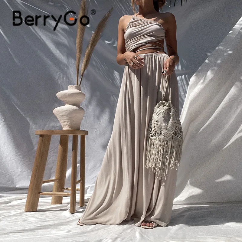 

BerryGo 2021 Autumn Sexy one shoulder lace up maxi dress women Fashion high split bandage party dress Casual elastic slim dress