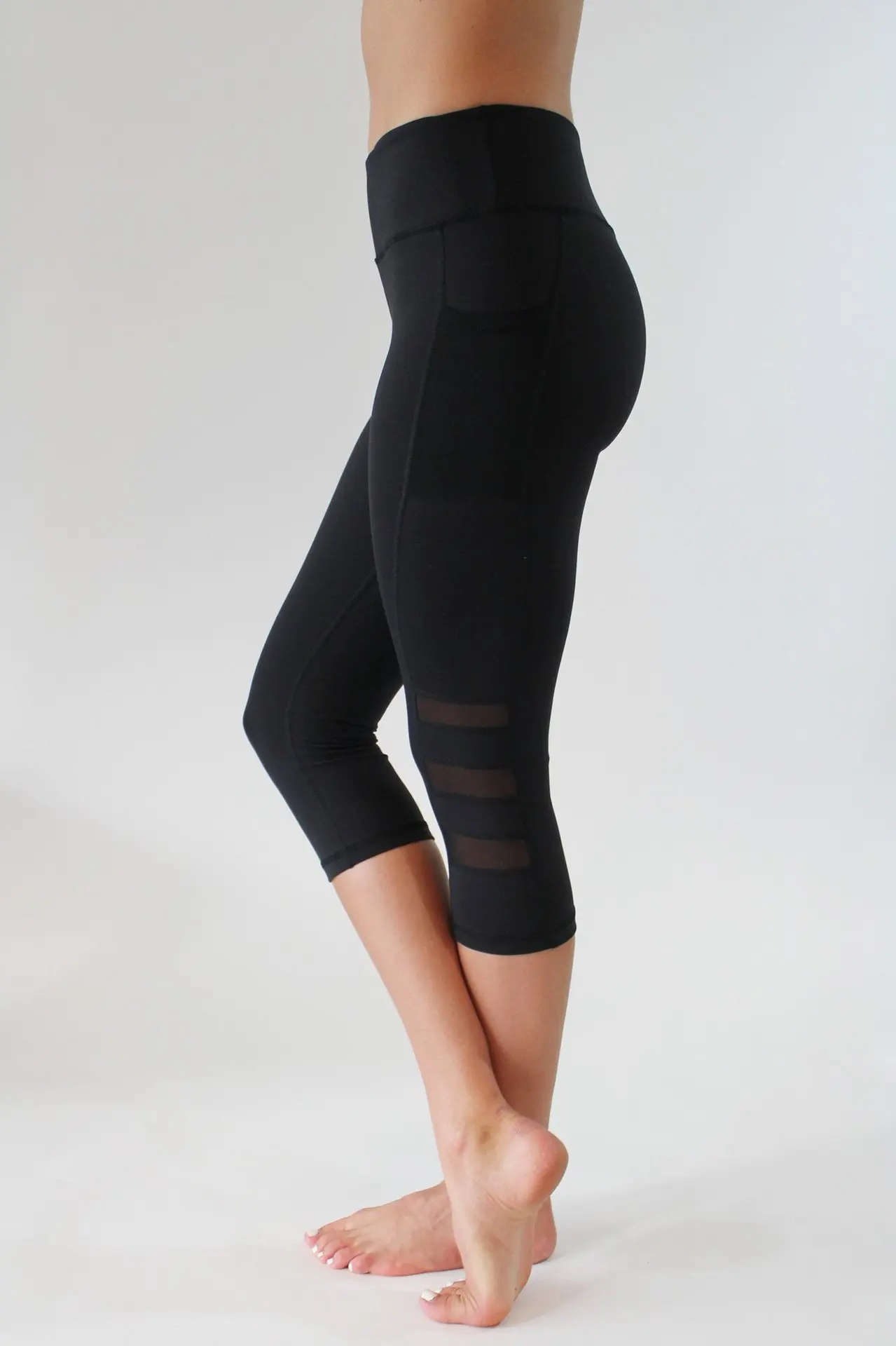 

2020 Hot Style Seven-point Running Sports Leggings Side Pocket Mobile Phone Three-section Mesh Yoga Pants Pants for Women