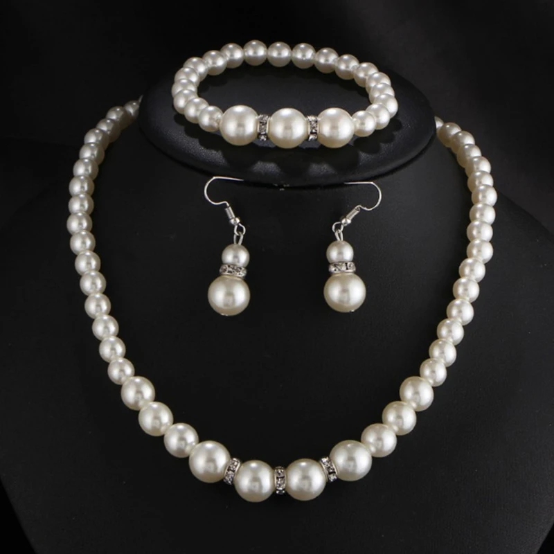 

Fashion European And American Pearl Set With Diamond Crystal Necklace Earrings Bracelet Set Women's Bridal Accessories