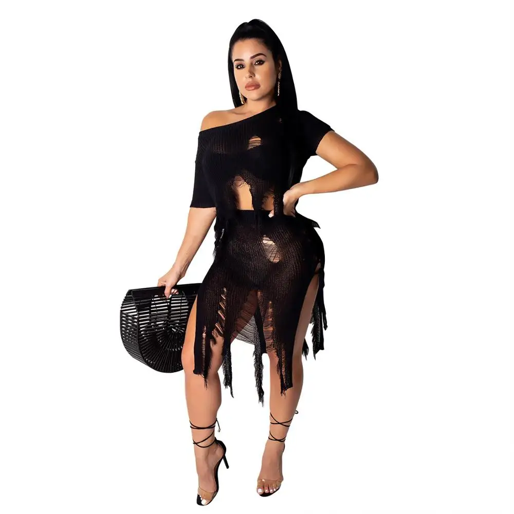

Knitted Hole Sexy 2 Piece Dress Summer Short Sleeve Crop Top And Tassel Spliced Irregular Skirts Women Hot Sale Outfits Q278