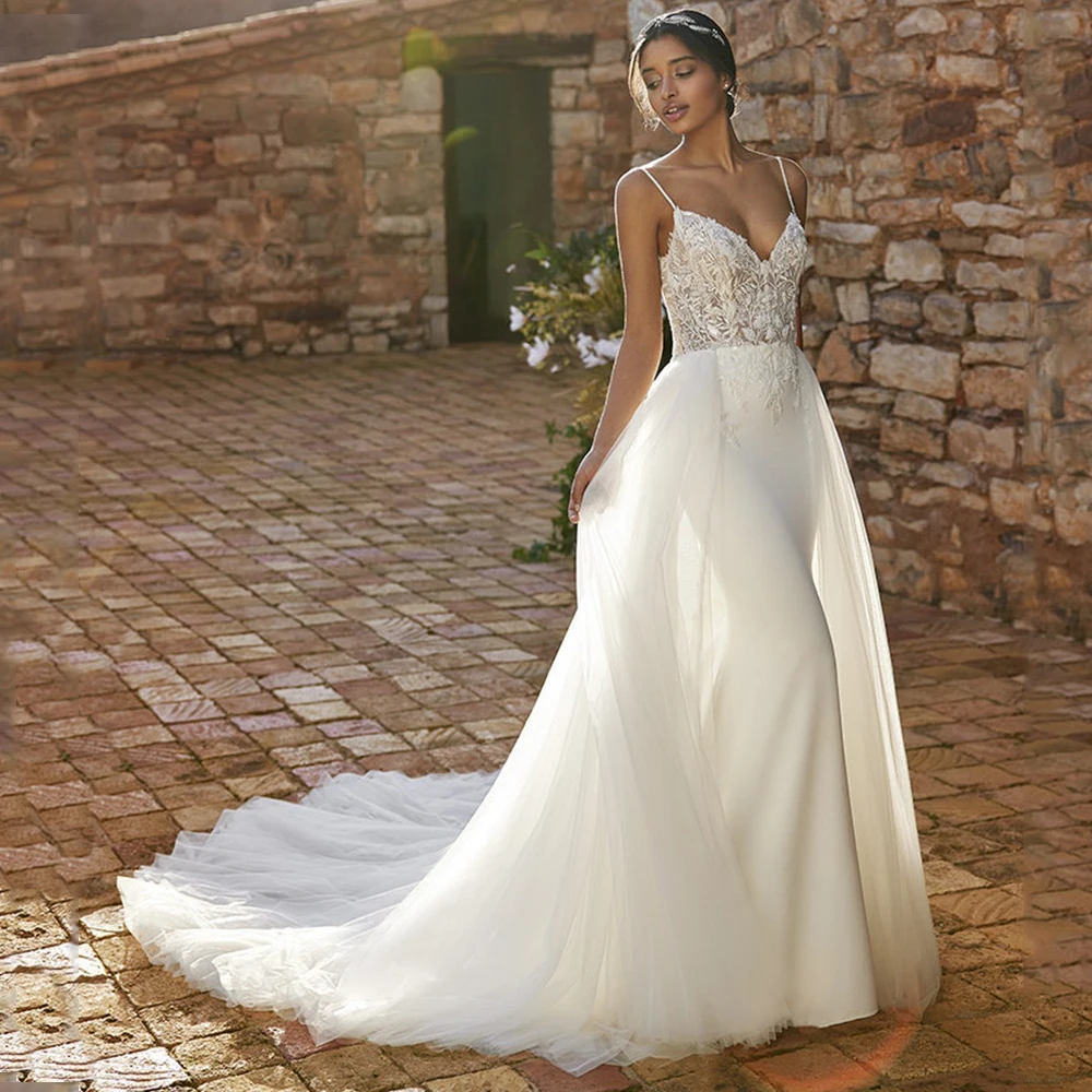 

Modern Detachable Train Mermaid Wedding Dresses Sexy Deep V-Neck Spaghetti Straps Lace Appliques Backless Bridal Gowns