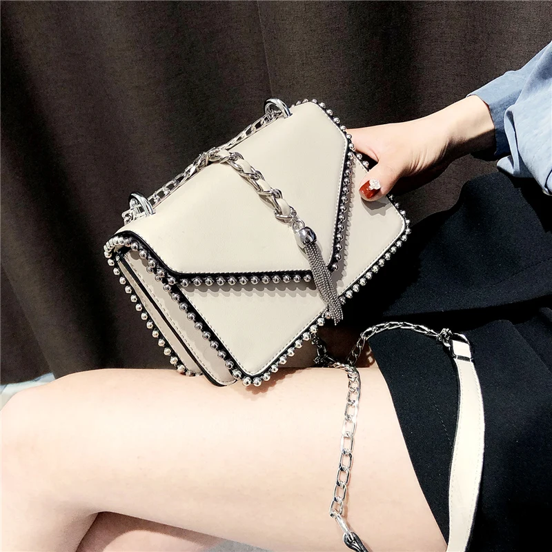 

British Fashion Simple Small Square bag Women's Designer Handbag 2021 High-quality PU leather Rivet Tassel Chain Shoulder bags