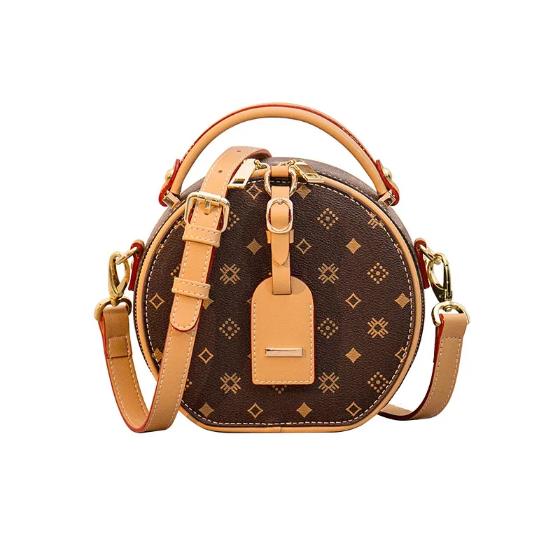 

Bag 2021 new Korean round bag women's Messenger Handbag retro simple one shoulder handbag old flower women's bag mobile wallet