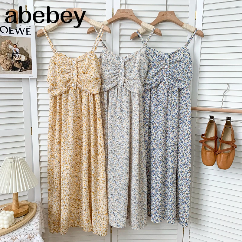 

Vintage V-neck sleeveless off shoulder Dress high waist pleated single breasted print mid-length A-line Dress 2021 New Summer