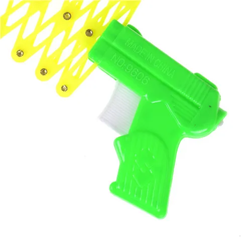 

Plastic Telescopic Elastic Fist Gun Magic Tricks Toys Random Color For Children Diy Manual Toy Kids Toys