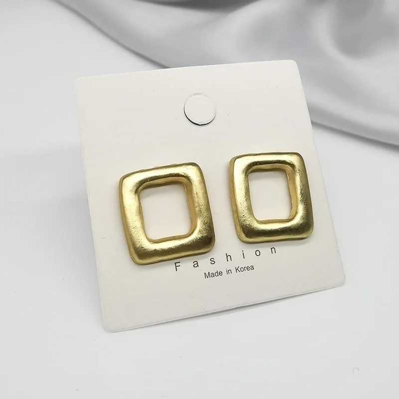 

S925 silver needle European and American wind metal earrings creative fashion alloy matte geometric square hollow stud earrings