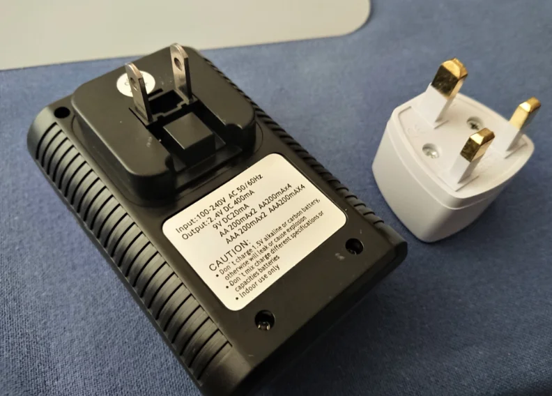 

US/UK Plug-Battery Charger Mains Intelligent Multi Charger For AA AAA & 9V Sizes Only Battery Not Included