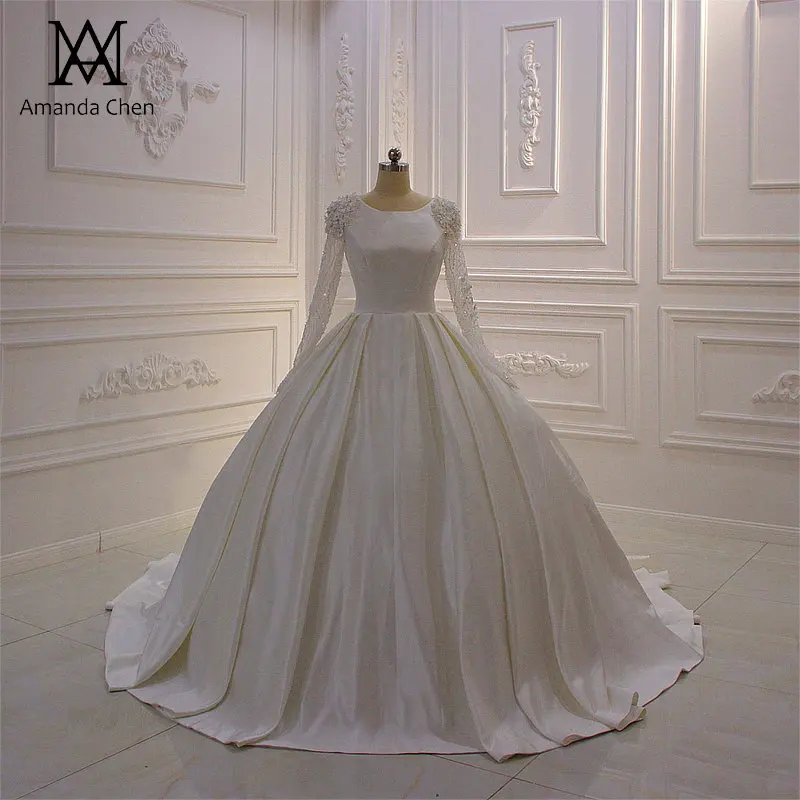 Мусульманское атласное свадебное платье с длинным рукавом украшенное