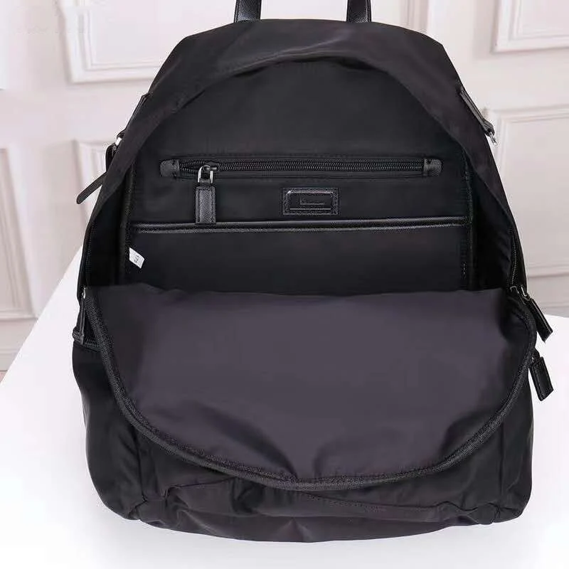 

Waterproof nylon backpack men's bag large-capacity Oxford cloth computer bag lightweight triangle logo travel backpack